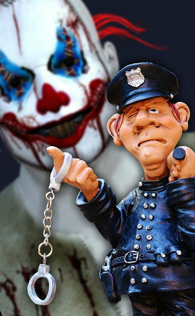 police officer with handcuffs stands as evil clown lurks in background